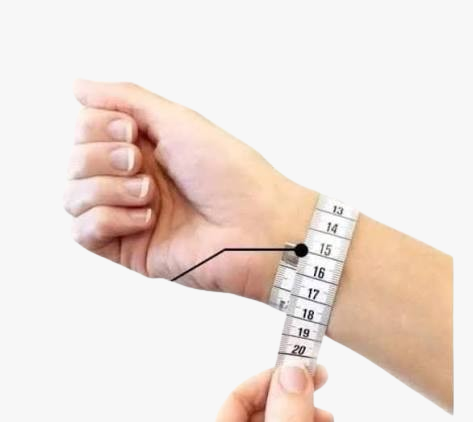 un poignet entourer d un ruban de mesure